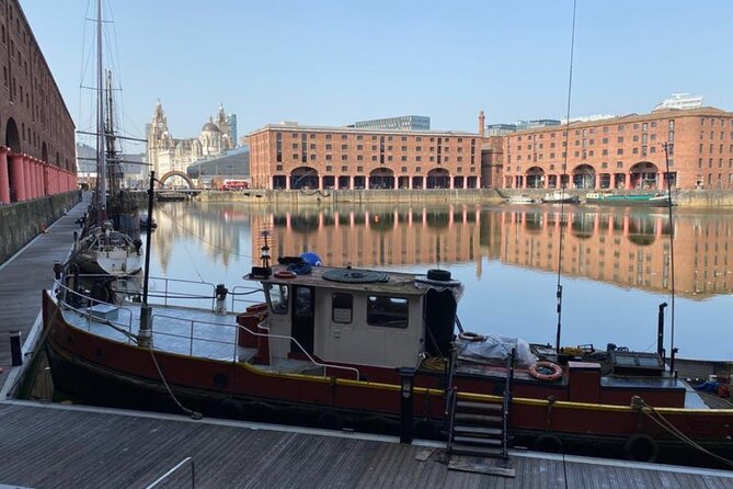 2-Hour Private Liverpool Walking Tour - John Lennon Statue: a quick pose, then back to the city