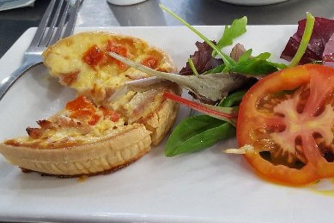 English Wine and Cheese Tour from London - Lunch at Chapel Down: picnic vibe, locally sourced food, and a wine glass