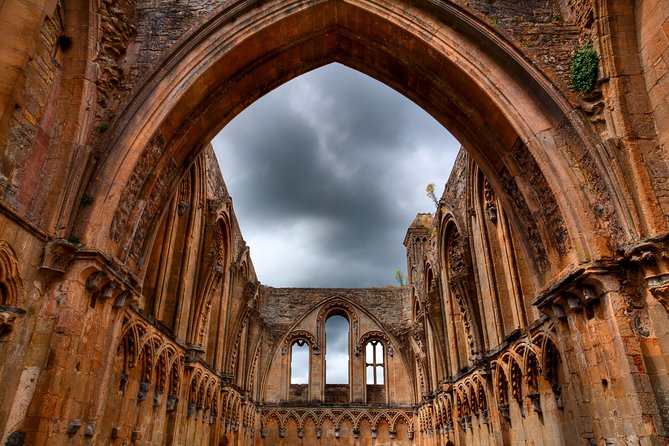 Glastonbury and Cheddar Gorge Guided Day Tour from London - Glastonbury Abbey and the Tor: ruins, stories, and steep steps