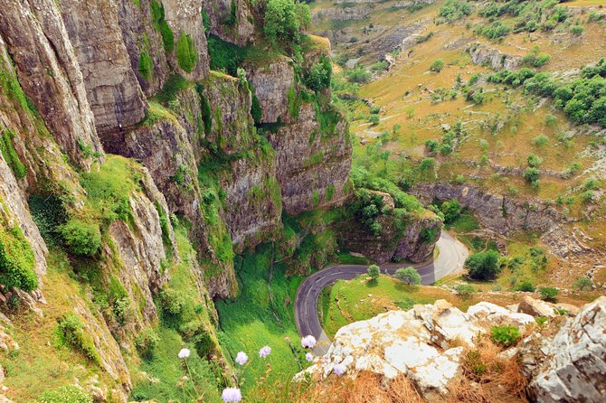 Glastonbury and Cheddar Gorge Guided Day Tour from London - Cheddar Gorge and Caves: views, walking time, and what can cost extra
