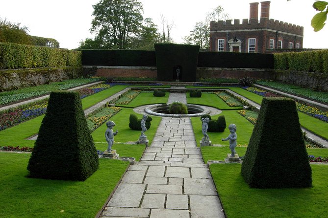 Hampton court palace private tour from London - The Maze, gardens, tennis court, and Thames views: where the day turns scenic