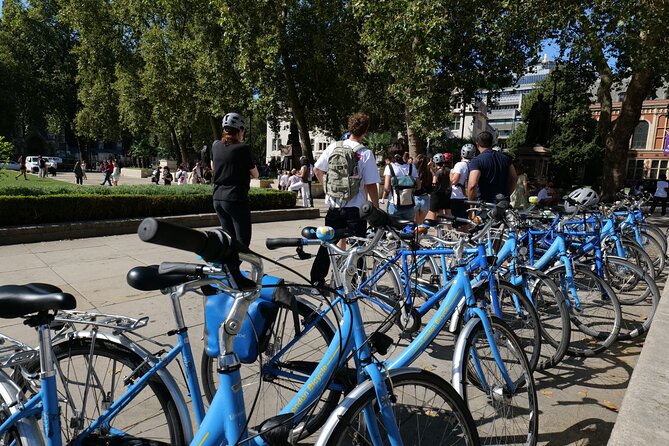 London Classic Landmarks Bike Tour with Local Guide - Trafalgar Square to Covent Garden: crowds, street performers, and quick photos
