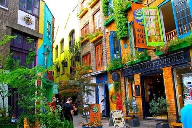 London West End Sunset Tour in Spanish - Street performances and pub stops, your built-in London evening