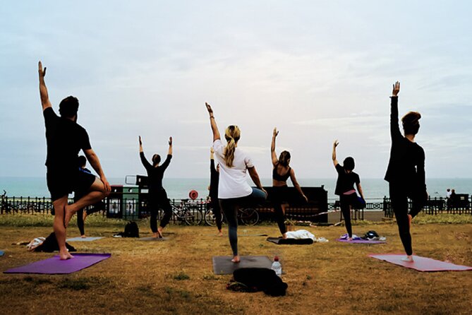 Outdoor Yoga Class at Brighton's Sea front - Sea Front Yoga in Brighton, with Xenia and an Orange Flag