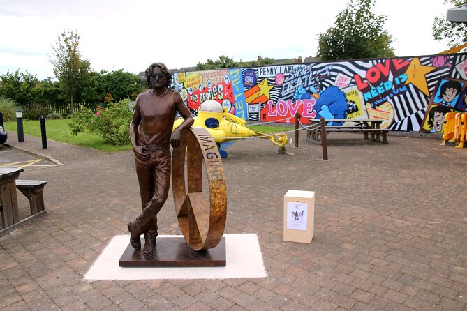 Private Beatles Car Tour, Penny Lane, Strawberry Field & childhood homes - Start at the Beatles Statues near Pier Head, then roll straight into the stories