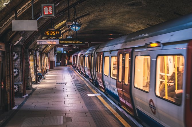 Secrets of the London Underground Small Group Walking Tour - Piccadilly Circus: The Underground’s Junction of Projects