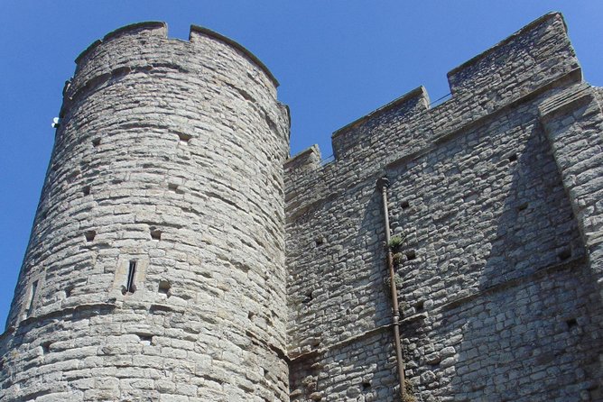 The Canterbury Classic Tour - Butchery Lane details: Bell Harry Tower area, the coat of arms, and a bull’s head
