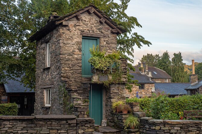 Ultimate Full-Day Lake District Tour: 10 Lakes, Amazing Scenery & Lake Cruise - Ullswater villages and steamers glimpsed from the road
