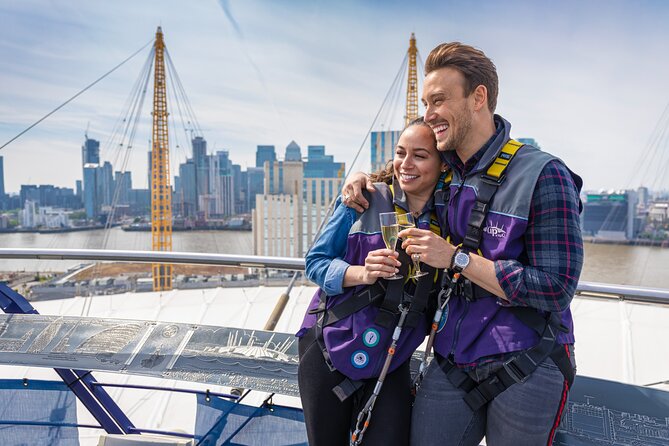 Up at The O2: Daytime Climb with Guided Tour with Panoramic Views - Winter snow globe at the summit: a seasonal reason to aim for late 2025
